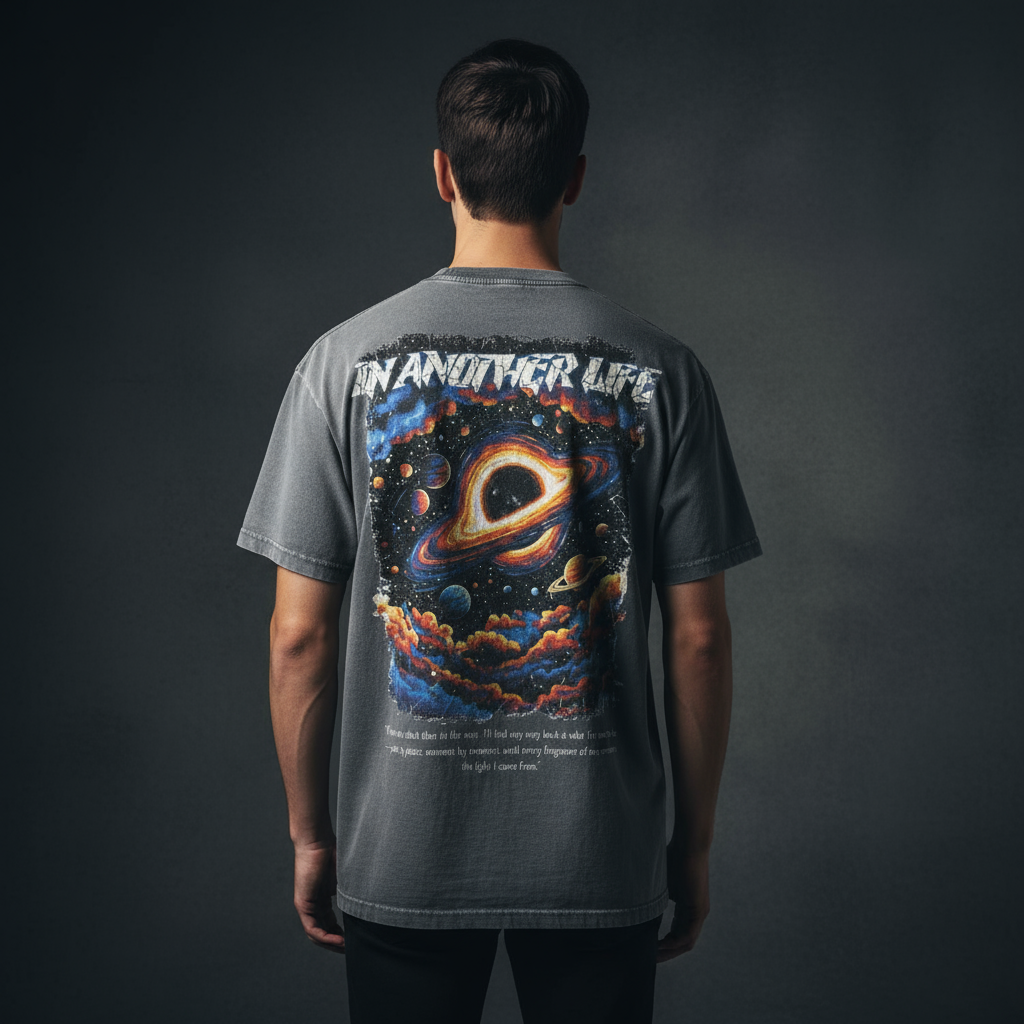 Male model wearing In Another Life graphic t-shirt